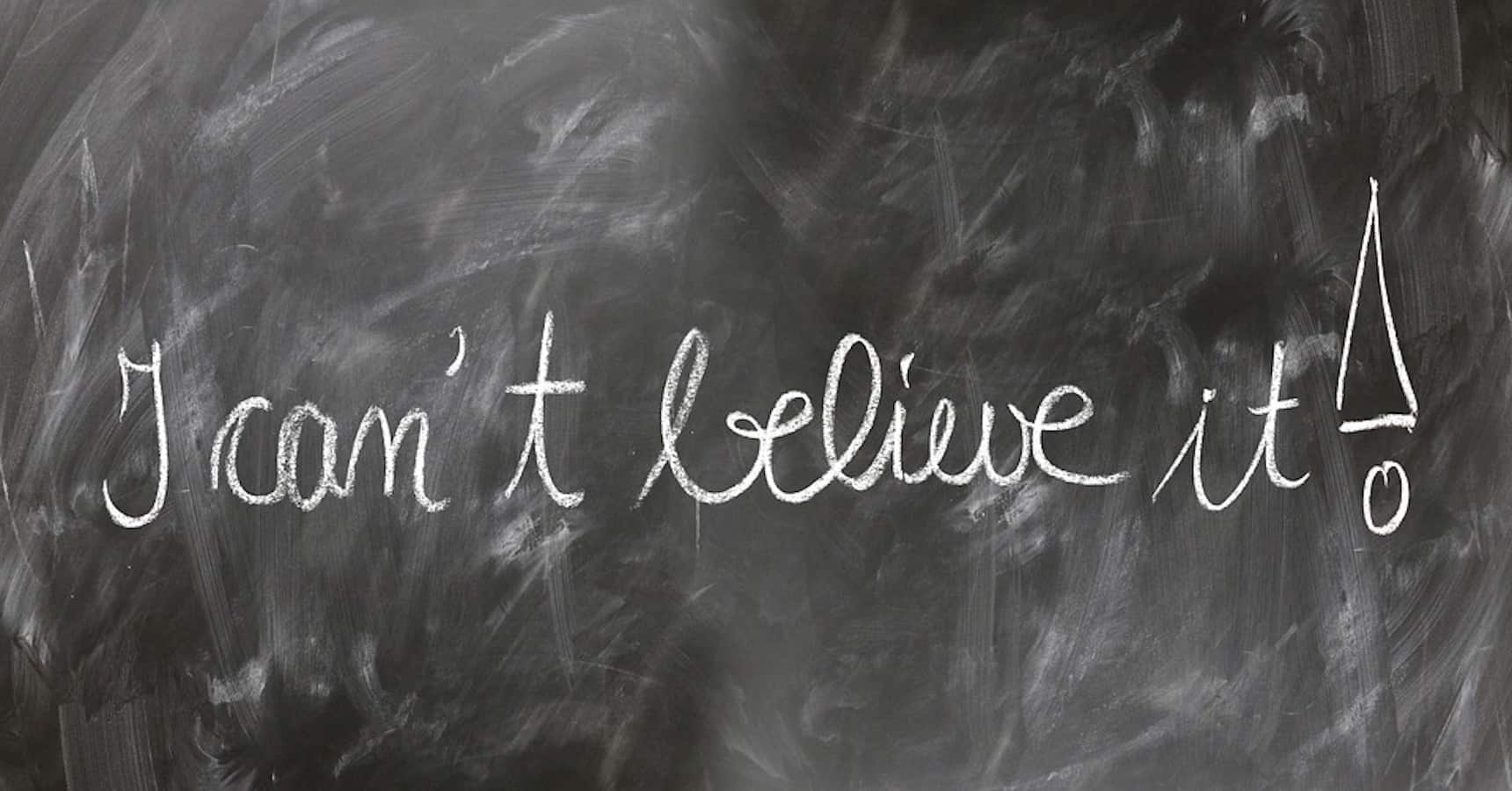 A chalkboard in a classroom saying I can't believe it